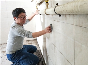 神華寧煤集團煤製油化工公管公司義務勞動讓職工浴室“亮”起來